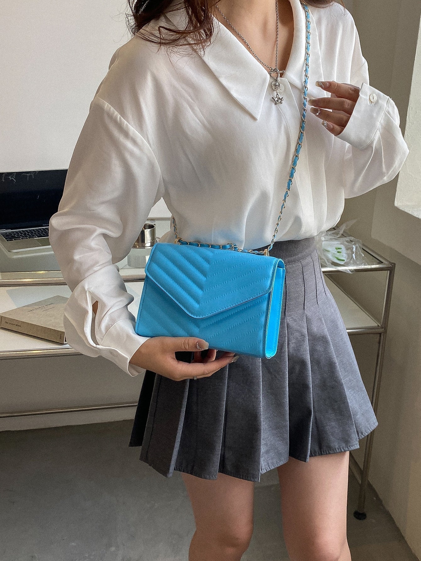 Quadratische Tasche mit Chevron Druckknopf