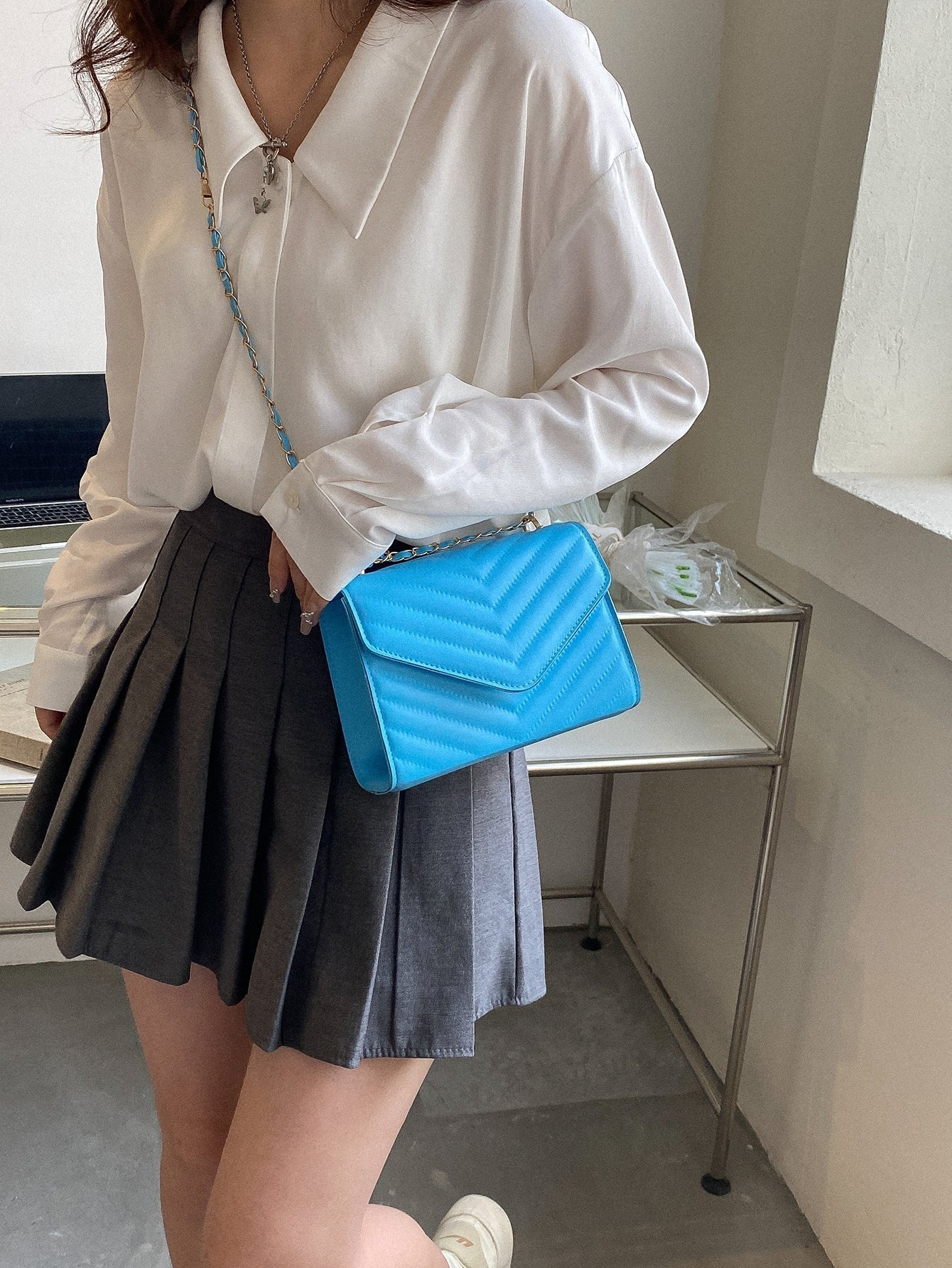 Quadratische Tasche mit Chevron Druckknopf